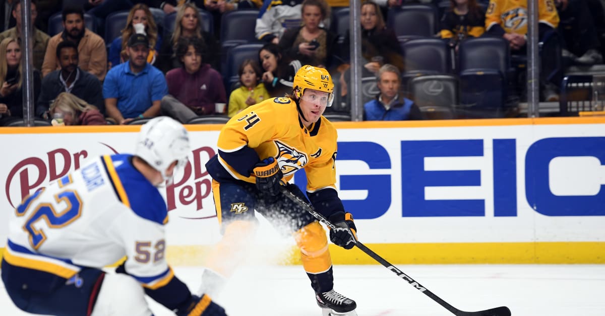 Nashville Predators defenseman Roman Josi, of Switzerland, talks with  referee Conor O'Donnell (41) in the third period of an NHL hockey game  Monday, Dec. 23, 2019, in Nashville, Tenn. The Predators won