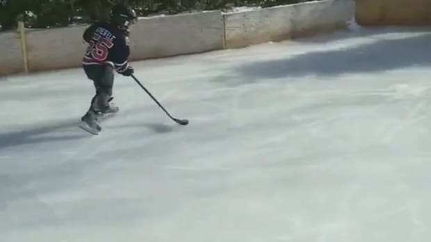 Young Hockey Player Having the Time of his Life