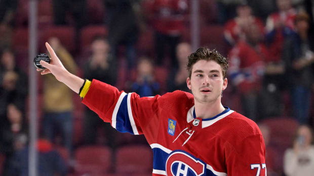 Oct 17, 2022; Montreal, Quebec, CAN; Montreal Canadiens forward Kirby Dach (77) salutes the crowd acfter the game against the Pittsburgh Penguins at the Bell Centre. Mandatory Credit: Eric Bolte-USA TODAY Sports