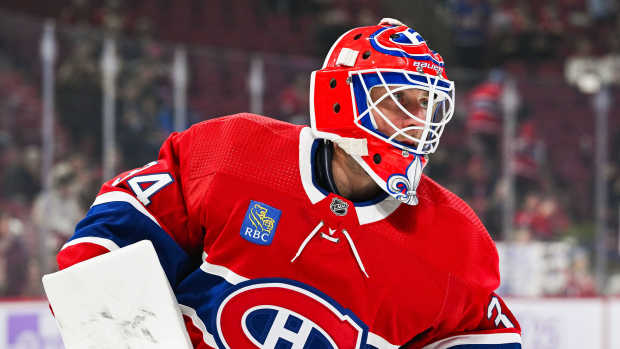 Nov 12, 2023; Montreal, Quebec, CAN; Montreal Canadiens goalie Jake Allen (34) looks on during warm-up before the game against the Vancouver Canucks at Bell Centre. Mandatory Credit: David Kirouac-USA TODAY Sports