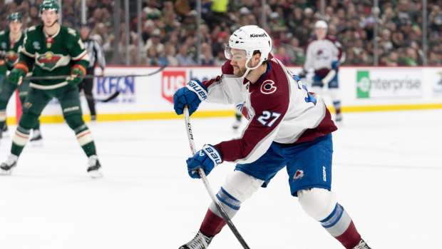 Apr 4, 2024; Saint Paul, Minnesota, USA; Colorado Avalanche left wing Jonathan Drouin (27) shoots all alone in the Minnesota Wild zone in the first period at Xcel Energy Center.