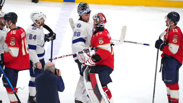 Apr 29, 2024; Sunrise, Florida, USA; Tampa Bay Lightning goaltender Andrei Vasilevskiy (88) congratulates Florida Panthers goaltender Sergei Bobrovsky (72) following game five of the first round of the 2024 Stanley Cup Playoffs at Amerant Bank Arena. The Panthers advance to the second round. Mandatory Credit: Jim Rassol-USA TODAY Sports  