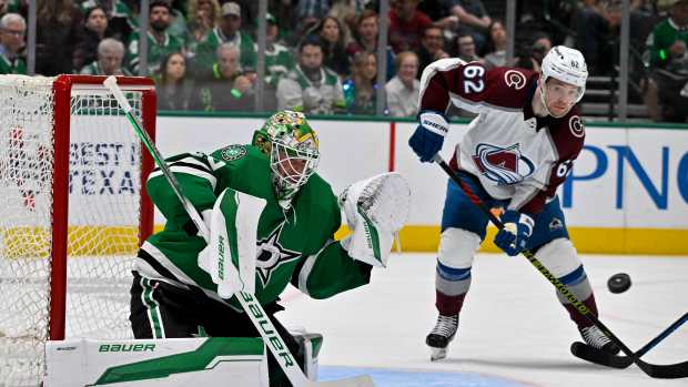 Colorado Avalanche left wing Artturi Lehkonen (62) looks to redirect the puck past Dallas Stars goaltender Jake Oettinger (29) during the third period in game five of the second round of the 2024 Stanley Cup Playoffs at American Airlines Center.