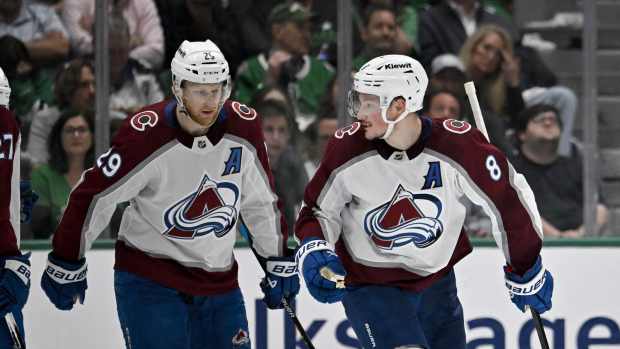 May 15, 2024; Dallas, Texas, USA; Colorado Avalanche center Nathan MacKinnon (29) and defenseman Cale Makar (8) skate off the ice after Makar scores a power play goal against the Dallas Stars during the second period in game five of the second round of the 2024 Stanley Cup Playoffs at American Airlines Center.