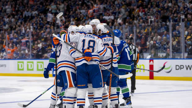 Edmonton Oilers celebrate a goal against the Vancouver Canucks in Game 7.
