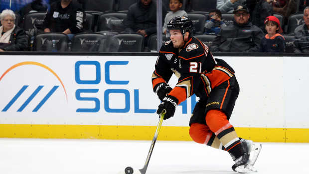 Mar 24, 2024; Anaheim, California, USA; Anaheim Ducks center Isac Lundestrom (21) skates with the puck during the second period against the Tampa Bay Lightning at Honda Center. Mandatory Credit: Jason Parkhurst-USA TODAY Sports  