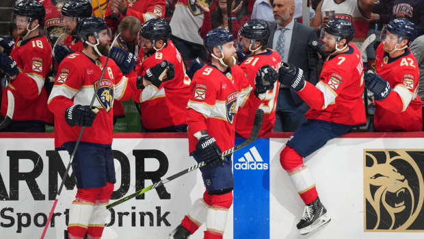 Jun 1, 2024; Sunrise, Florida, USA; Florida Panthers center Sam Bennett (9) celebrates a goal against the New York Rangers with defenseman Dmitry Kulikov (7) during the first period in game six of the Eastern Conference Final of the 2024 Stanley Cup Playoffs at Amerant Bank Arena. Mandatory Credit: Jim Rassol-USA TODAY Sports  