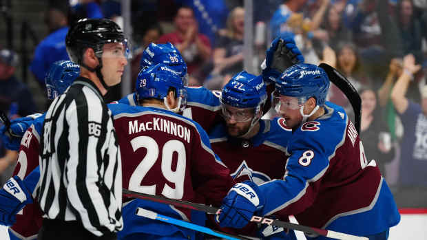 May 17, 2024; Denver, Colorado, USA; Colorado Avalanche right wing Mikko Rantanen (96) celebrates his goal with center Nathan MacKinnon (29) and left wing Jonathan Drouin (27) and defenseman Cale Makar (8) and left wing Artturi Lehkonen (62) in the second period against the Dallas Stars in game six of the second round of the 2024 Stanley Cup Playoffs at Ball Arena.