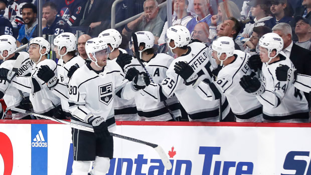 Los Angeles Kings forward Dustin Brown (23) is congratulated on his goal  against the Vegas Gold …