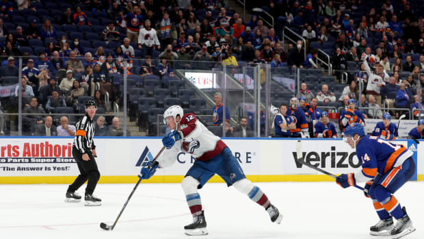 Colorado Avalanche goalie Pavel Francouz deflects a shot during the first  period of the team's NHL hockey game against the Minnesota Wild, Friday,  April 29, 2022, in St. Paul, Minn. (AP Photo/Jim