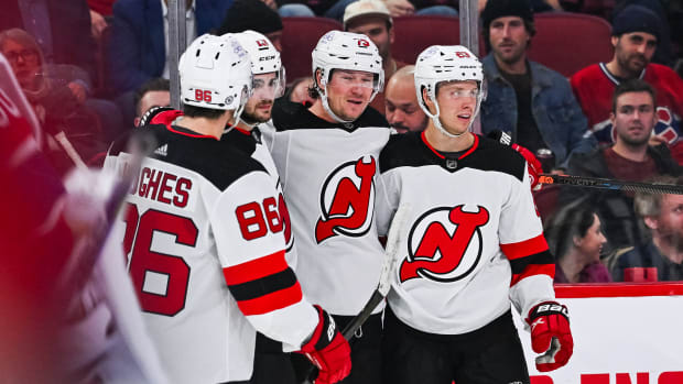 New Jersey Devils right wing Timo Meier (96) celebrates with center Nico  Hischier (13) after scoring a goal against the Pittsburgh Penguins during  the second period of an NHL hockey game Tuesday