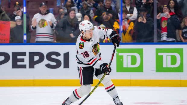 Nov 16, 2024; Vancouver, British Columbia, CAN; Chicago Blackhawks forward Connor Bedard (98) shoots during warm up prior to a game against the Vancouver Canucks at Rogers Arena. Mandatory Credit: Bob Frid-Imagn Images