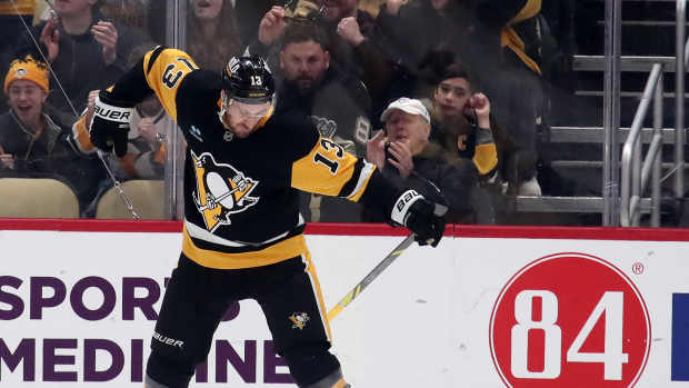 Jan 12, 2025; Pittsburgh, Pennsylvania, USA; Pittsburgh Penguins right wing Kevin Hayes (13) reacts after scoring a goal against the Tampa Bay Lightning during the third period at PPG Paints Arena. Mandatory Credit: Charles LeClaire-Imagn Images  