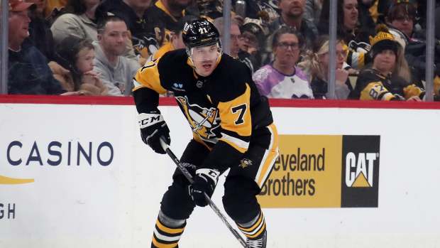 Dec 23, 2024; Pittsburgh, Pennsylvania, USA; Pittsburgh Penguins center Evgeni Malkin (71) handles the puck against the Philadelphia Flyers during the first period at PPG Paints Arena. Mandatory Credit: Charles LeClaire-Imagn Images