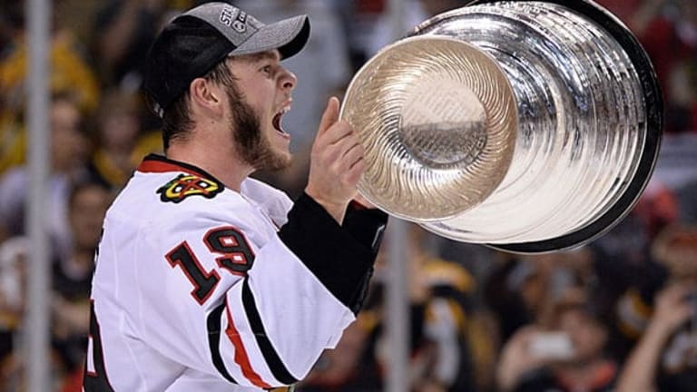 This is Jonathan Toews with the Stanley Cup that he has won three