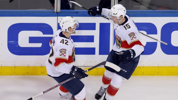 May 30, 2024; New York, New York, USA; Florida Panthers center Anton Lundell (15) celebrates his goal against the New York Rangers with defenseman Gustav Forsling (42) during the third period of game five of the Eastern Conference Final of the 2024 Stanley Cup Playoffs at Madison Square Garden. Mandatory Credit: Brad Penner-USA TODAY Sports  
