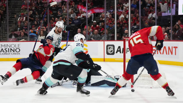 Florida Panthers center Sam Bennett (9) controls the puck in front