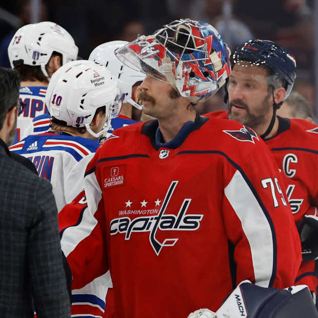 Washington Capitals goaltender Charlie Lindgren (79) and Capitals left wing Alex Ovechkin (8) shake hands with New York Rangers players