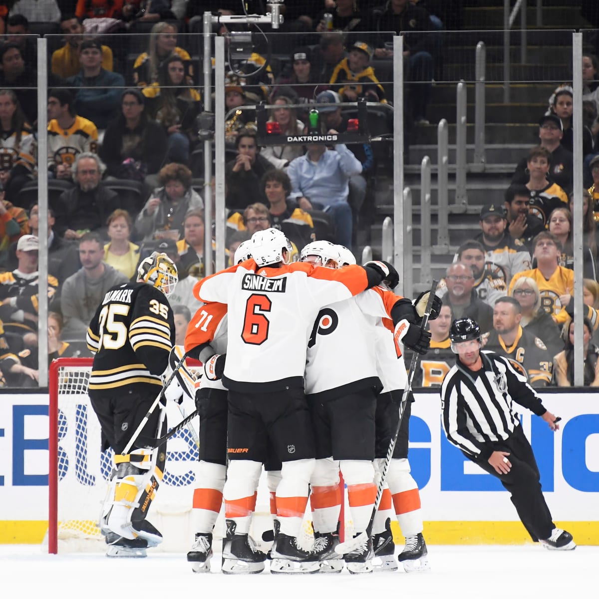 Bruins score four times in 3rd period, win in shootout