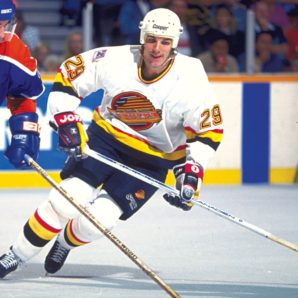 THE PUCK REPORT: Today In NHL History - Gino Odjick Fights Blues