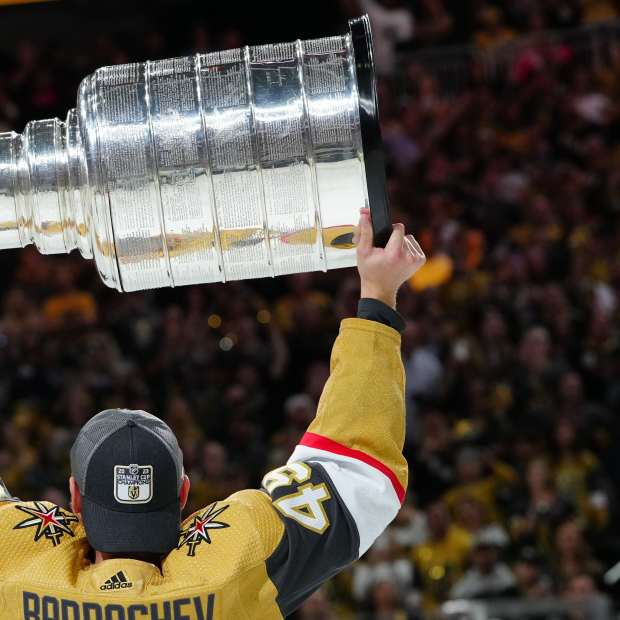 Vegas Golden Knights forward Ivan Barbashev (49) hoists the Stanley Cup