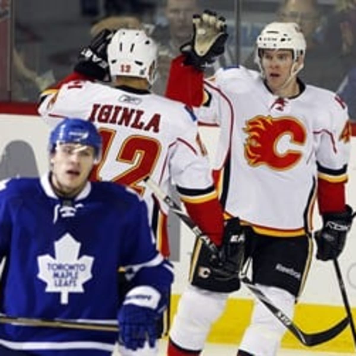 Visiting Calgary Flames Dion Phaneuf with the puck during the