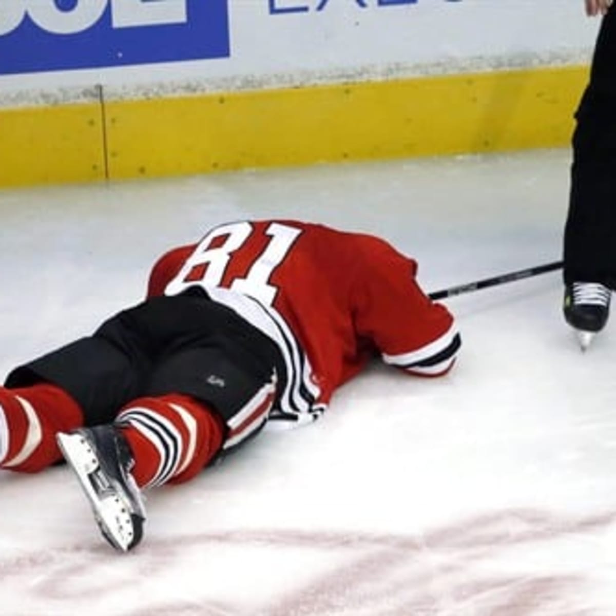 Marian Hossa leaves game on stretcher, then needs ambulance - NBC