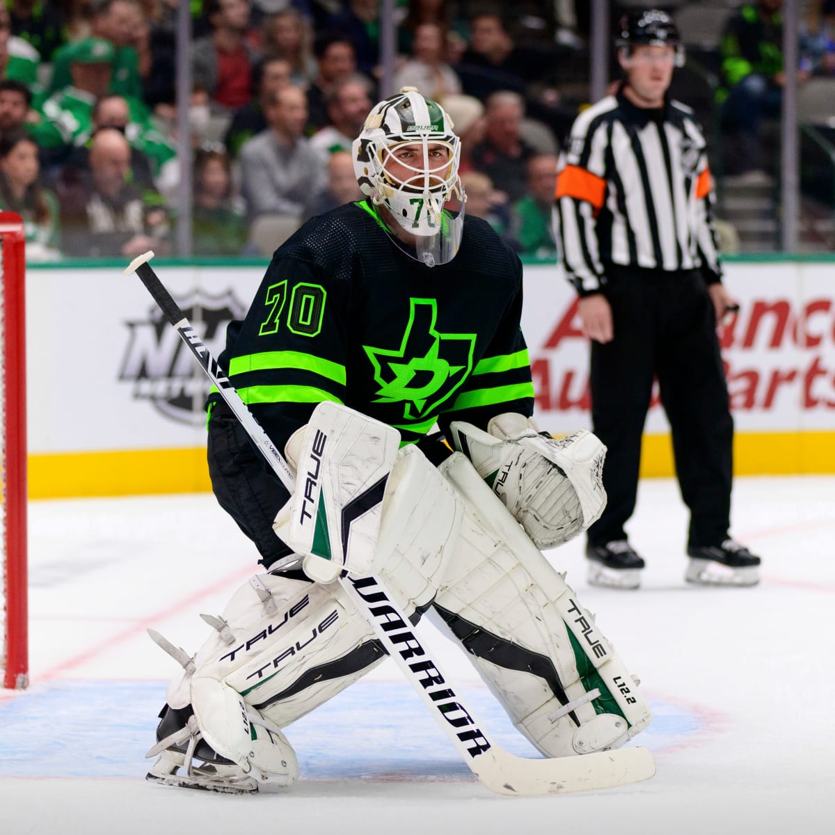 Dallas Stars goaltender Braden Holtby looks up at the video