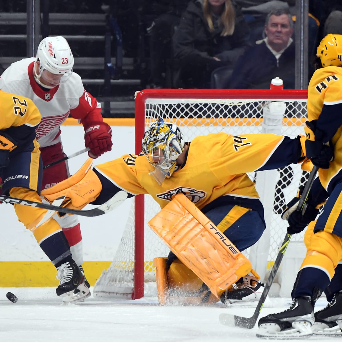 Nashville Predators left wing Kiefer Sherwood (44) celebrates with center  Philip Tomasino (26) after his goal against the Detroit Red Wings during  the second period of an NHL hockey game Tuesday, March