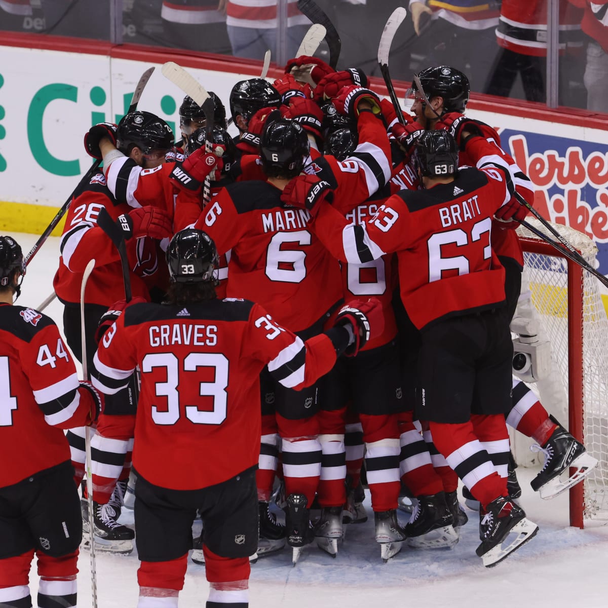 New Jersey Devils goaltender Akira Schmid (40) celebrates with teammates  after the Devils defeated the New York Rangers in Game 7 of an NHL hockey  Stanley Cup first-round playoff series Monday, May