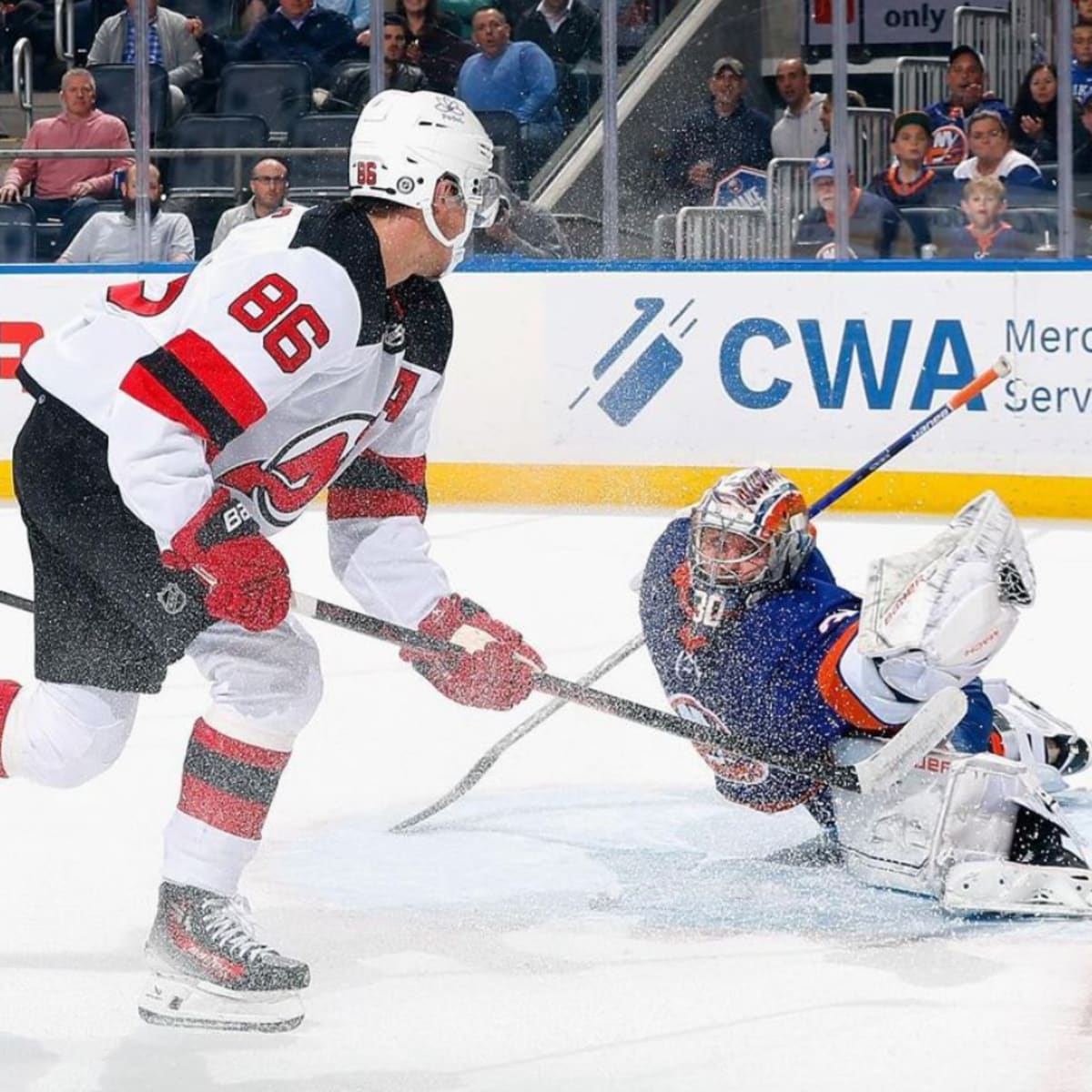 Jack Hughes has 2 goals and 2 assists as Devils top Islanders 5-4 in OT