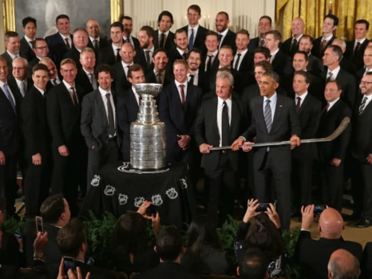 NHL's Stanley Cup rests on a table in front of a portrait of Martha  Washington, wife of first president George Washington, just prior to U.S.  President Barack Obama honoring the players and