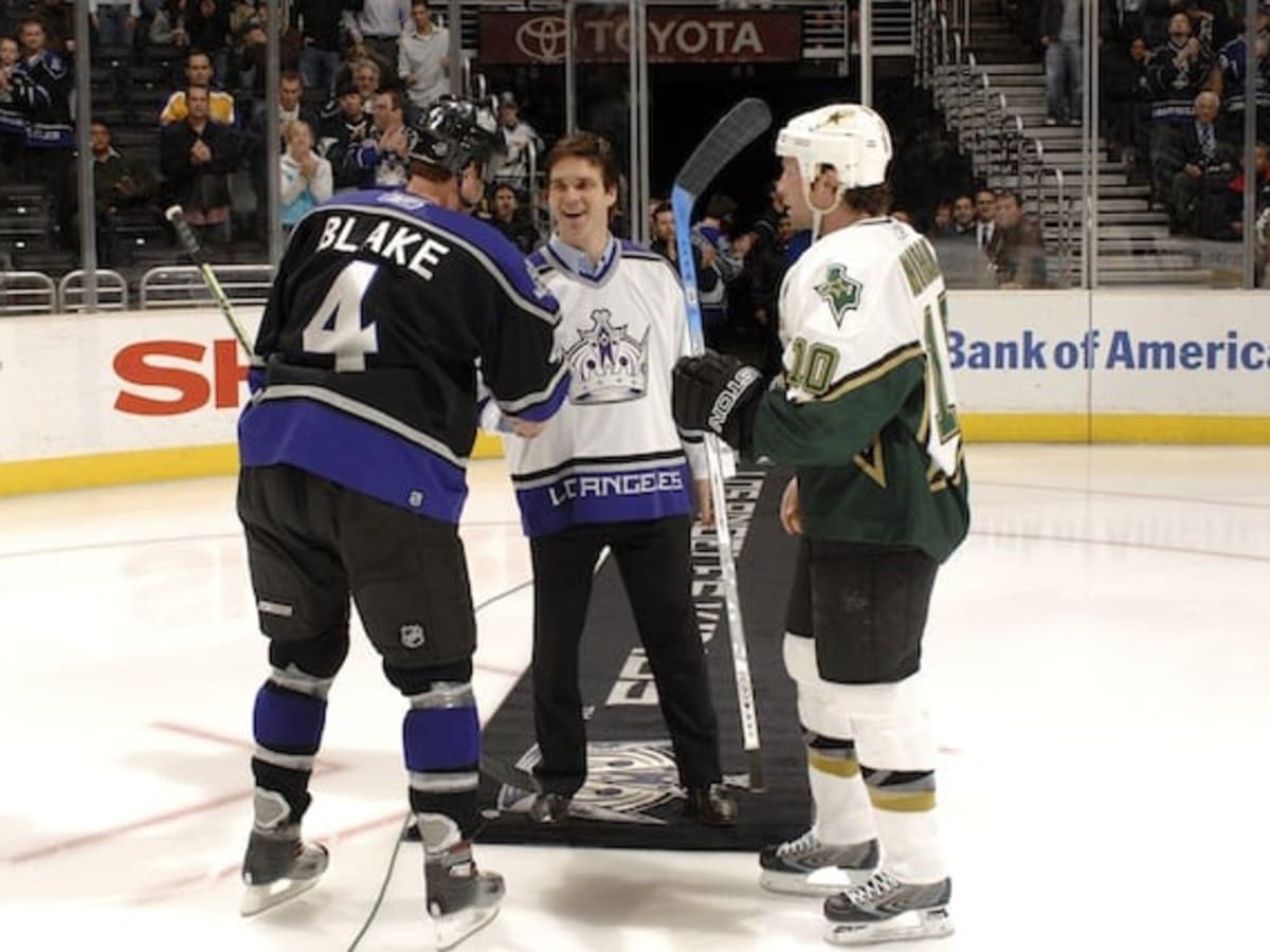 Kings President of Hockey Ops, Luc Robitaille, addresses the media