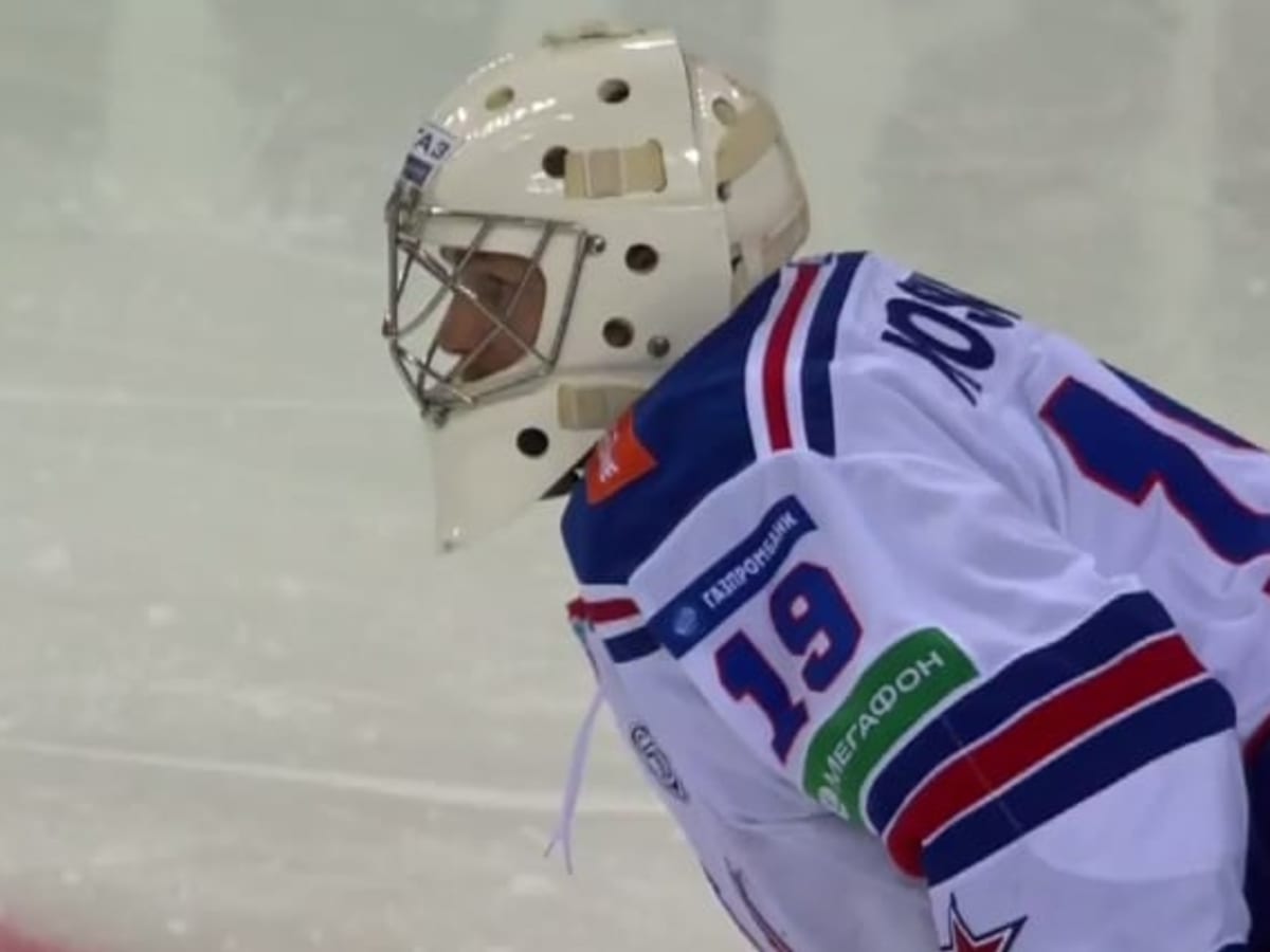 KHL goalie uses butt end of stick to make desperation save - The Hockey News