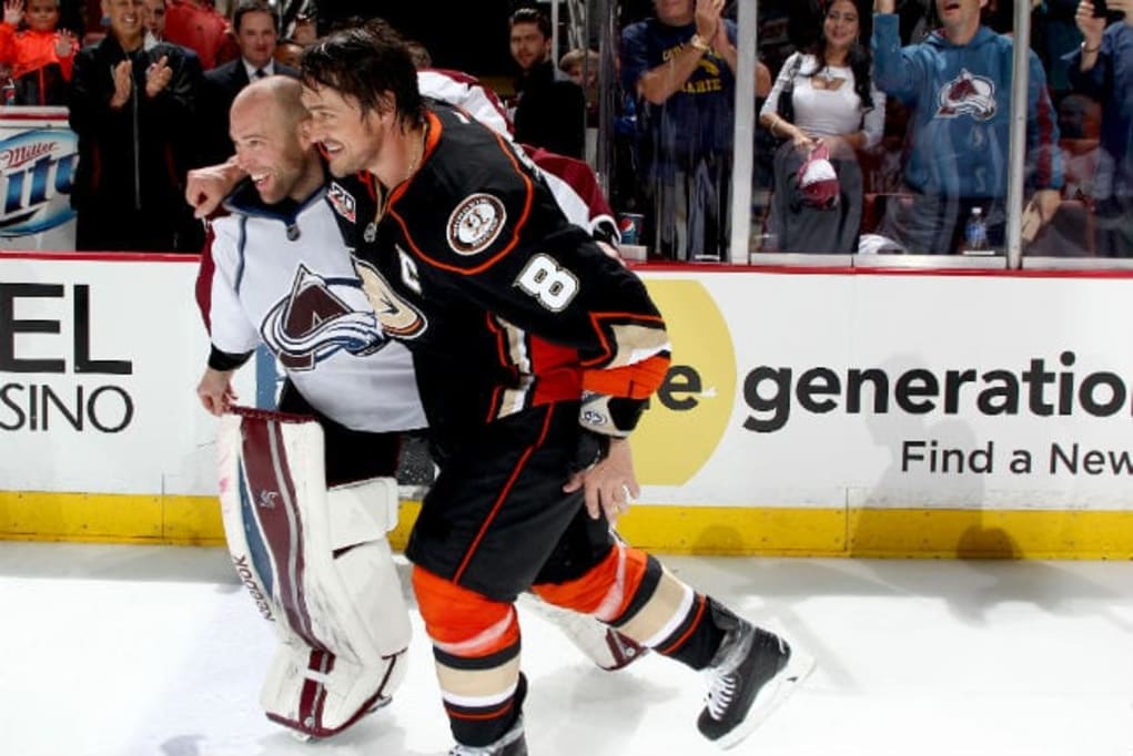 teemu-selanne-takes-one-final-lap--and-brings-jiggy-with-him.jpg