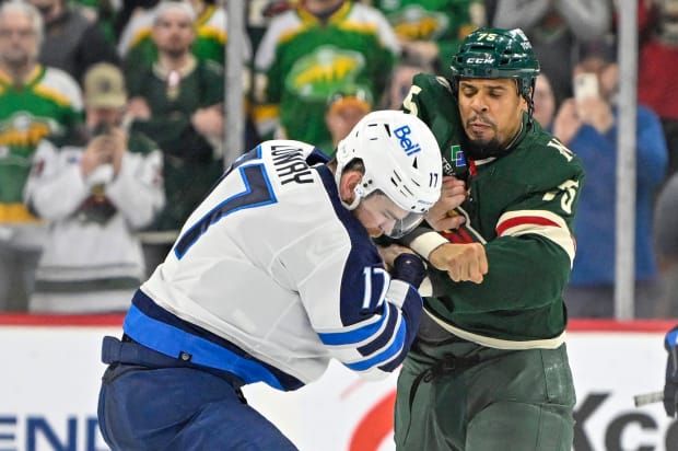 Hellebuyck brilliant as Jets edge Wild 3-1 to secure playoff spot