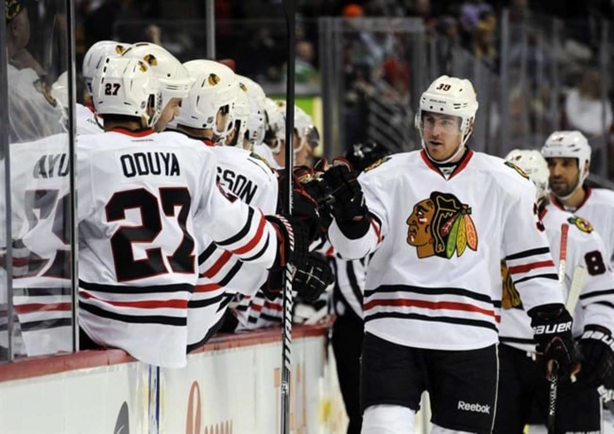 Emery Stops 17 Shots, Kane Has Goal And 2 Assists As Blackhawks Beat ...