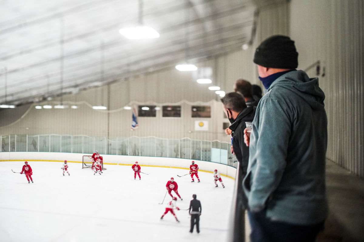 Invested moms and dads watch over their hopeful teens at Brewster Ice Arena, outside New York City.