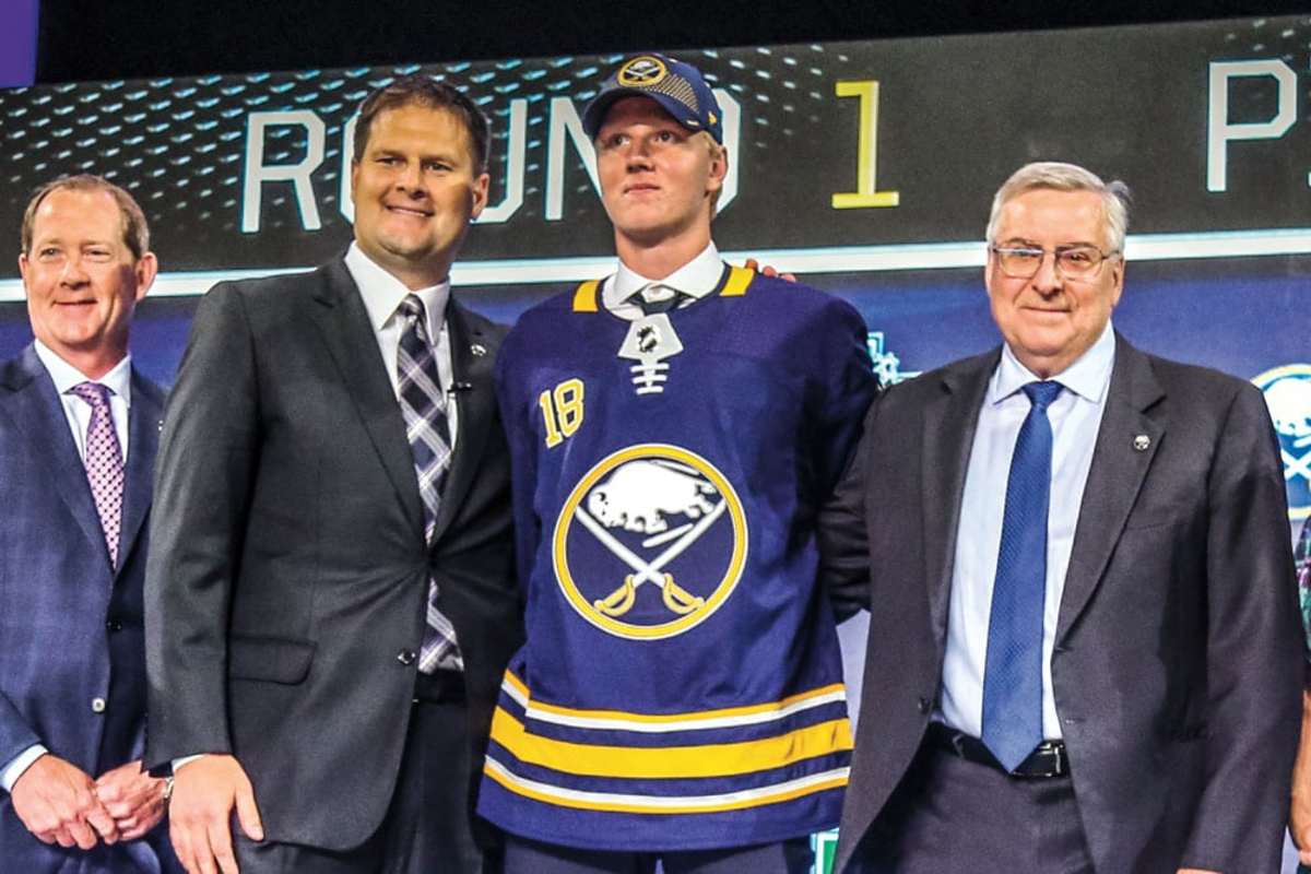  RASMUS ON BOARD Coach Phil Housley, Botterill and owner Terry Pegula welcome Dahlin to Sabres country.Matthew Pearce/Icon Sportswire via Getty Images