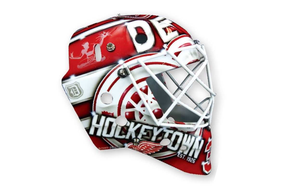 28. Jimmy Howard, Red Wings (artist: Ray Bishop) Wings logo, Hockeytown logo…it all looks perfectly pretty, but it’s nothing you can’t already see on Howard’s jersey or the ice at Little Caesars Arena.