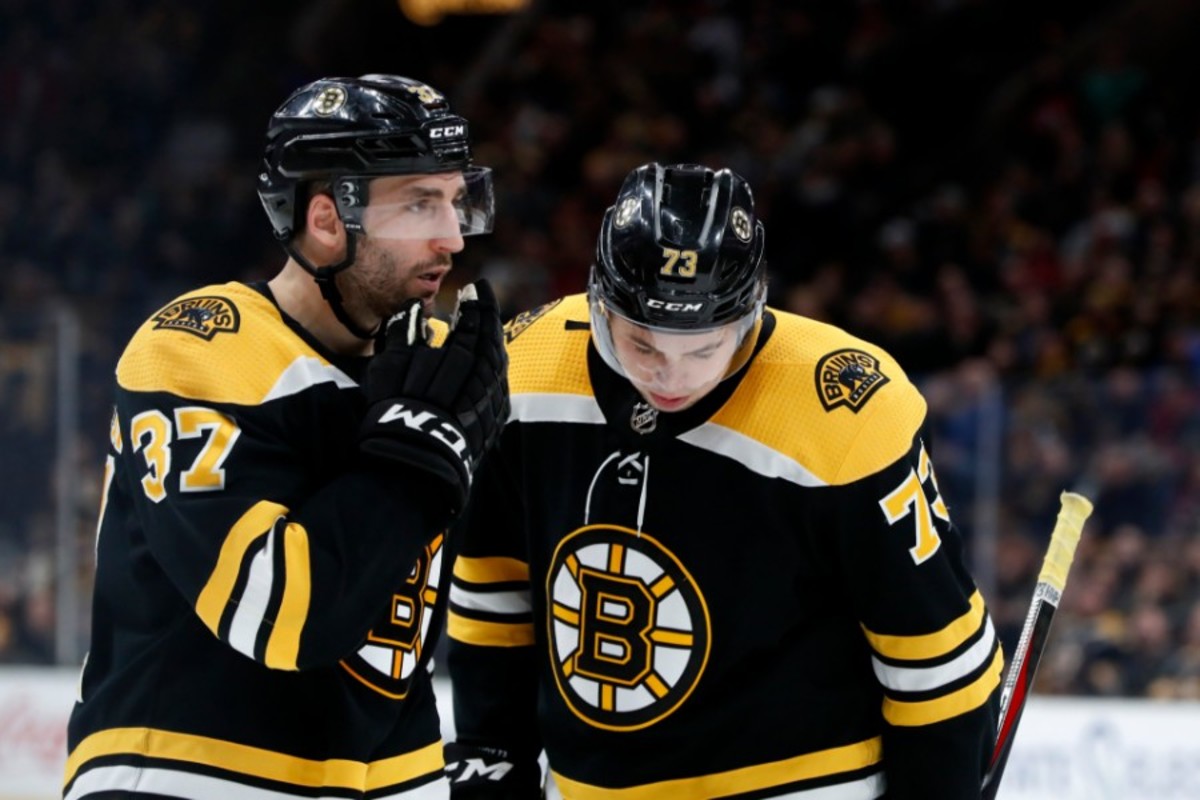 Patrice Bergeron and Charlie McAvoy