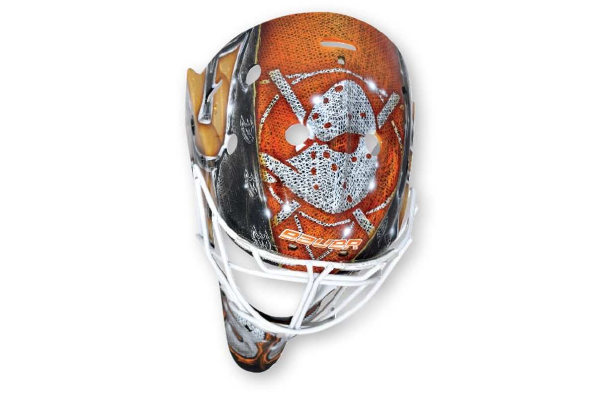 27. John Gibson, Ducks (artist: Dave Gunnarsson) Gibson has a great alternate mask for the Ducks’ 25th anniversary, but I’m only grading the starters’ primary lids here. Two numbers take up most of the real estate here: Gibson’s 36 and a 25 to represent the anniversary. Meh.