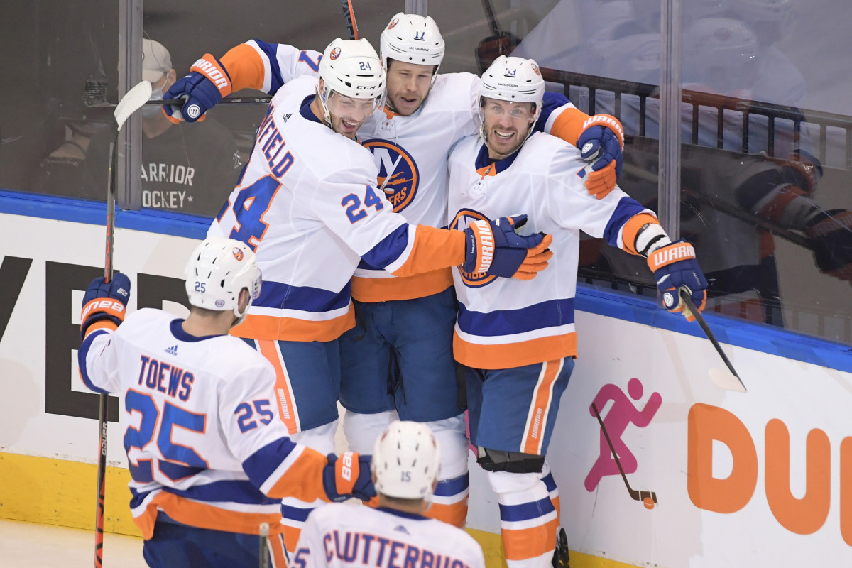Matt Martin celebrates a goal with his New York Islanders teammates.