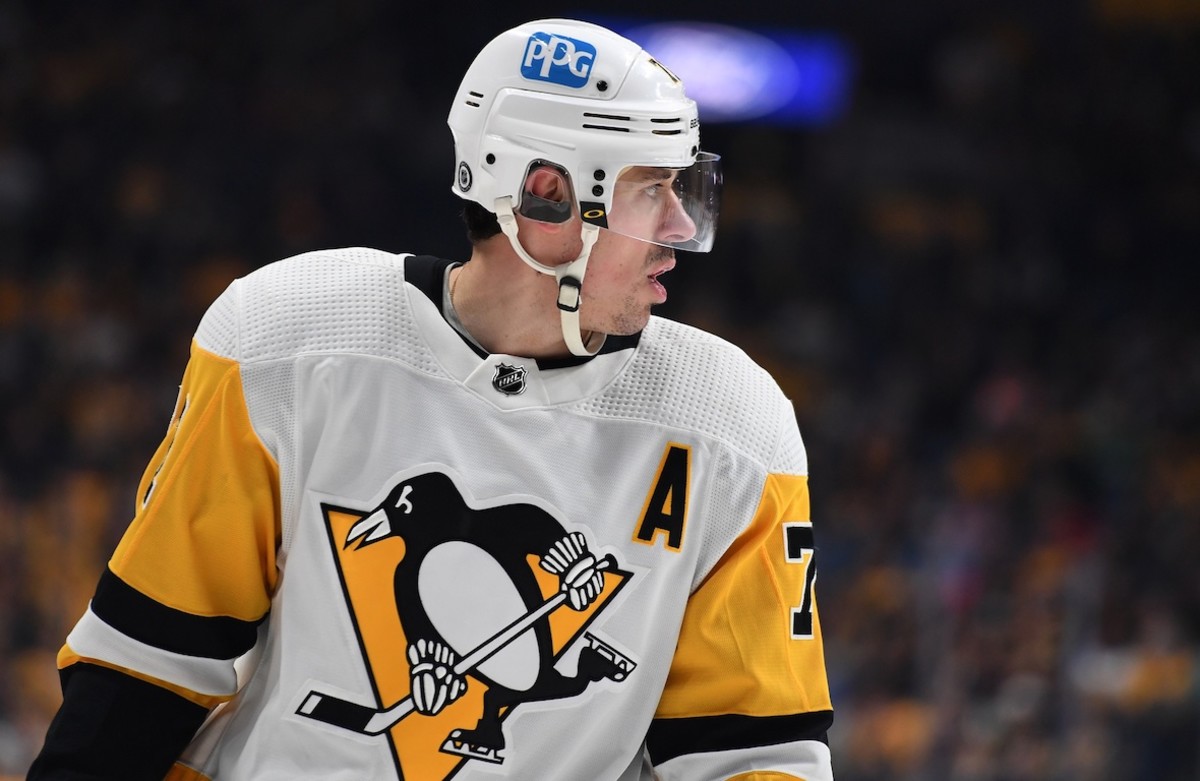 Pittsburgh Penguins' Evgeni Malkin prepares to take a face-off