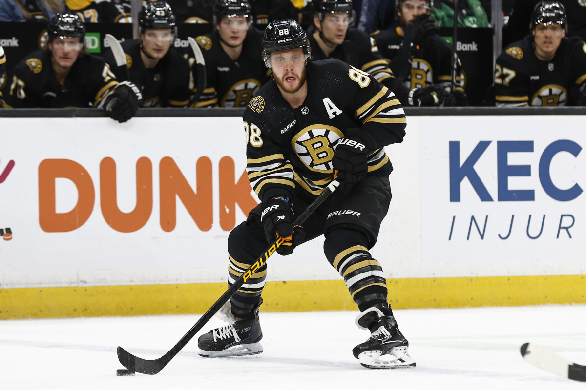 Jan 22, 2024; Boston, Massachusetts, USA; Boston Bruins right wing David Pastrnak (88) skates over the blue line during the second period against the Winnipeg Jets at TD Garden. Mandatory Credit: Winslow Townson-USA TODAY Sports