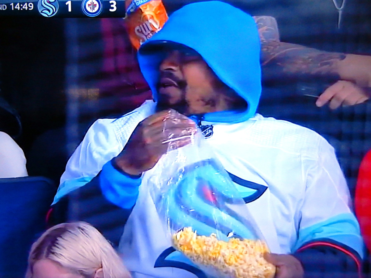 Marshawn Lynch Goes Popcorn Mode At Seattle Kraken Game In Winnipeg The Hockey News Seattle