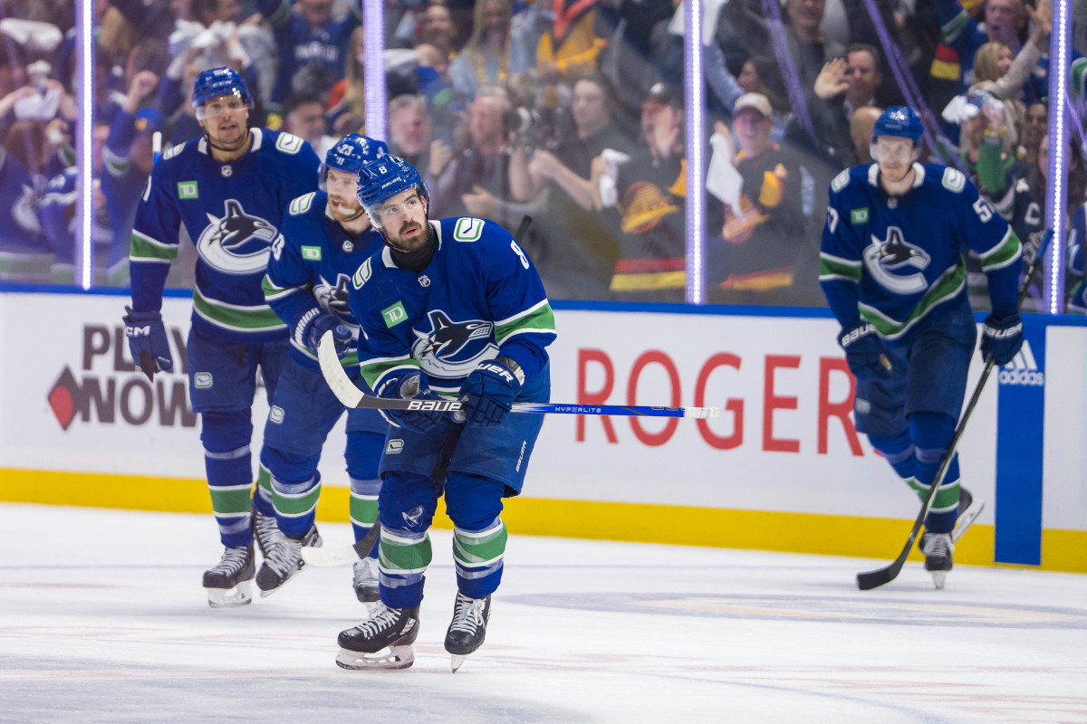 May 8, 2024; Vancouver, British Columbia, CAN; Vancouver Canucks forward Dakota Joshua (81) and defenseman Carson Soucy (7) and forward Conor Garland (8) and defenseman Tyler Myers (57) and forward Elias Lindholm (23) celebrate Garland’s game winning goal against the Edmonton Oilers during the third period in game one of the second round of the 2024 Stanley Cup Playoffs at Rogers Arena. Mandatory Credit: Bob Frid-USA TODAY Sports