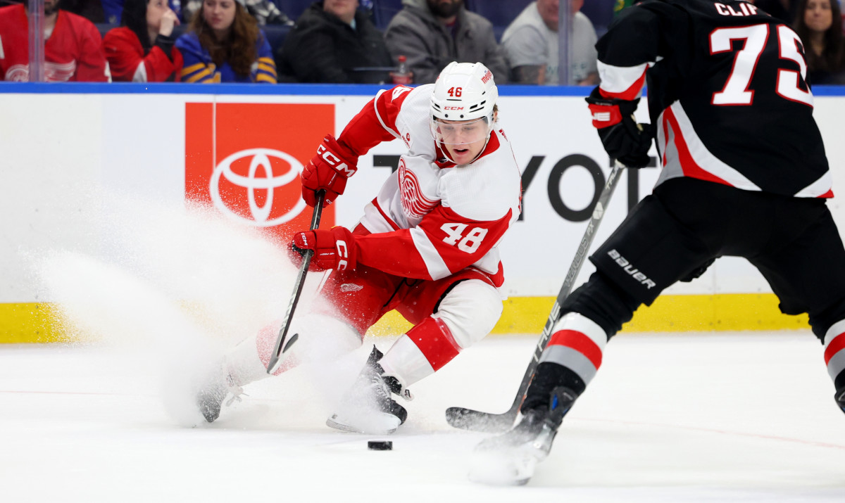 Detroit Red Wings right wing Jonatan Berggren (48) stops skating with the puck during the first period against the Buffalo Sabres at KeyBank Center.