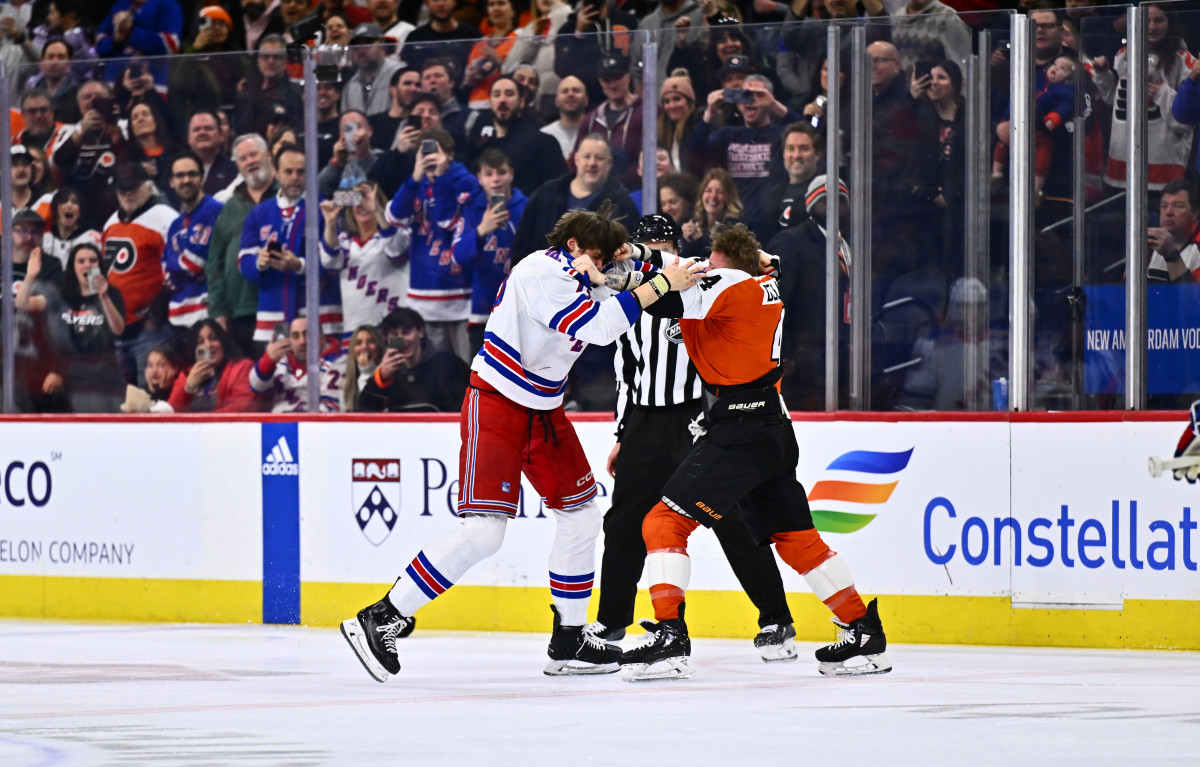 Philadelphia Flyers left wing Nicolas Deslauriers (44) and New York Rangers center Matt Rempe (73) fight in the first period at Wells Fargo Center.