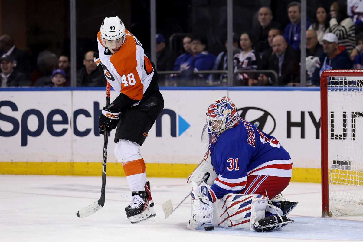 New York Rangers goaltender Igor Shesterkin (31) makes a save in front of Philadelphia Flyers center Morgan Frost (48) during the second period at Madison Square Garden.